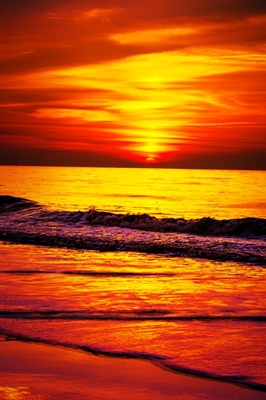 Solnedgang ved sjøen