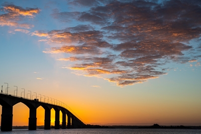 Východ slunce nad mostem Öland