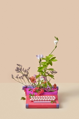 Machine à écrire rétro avec fleurs