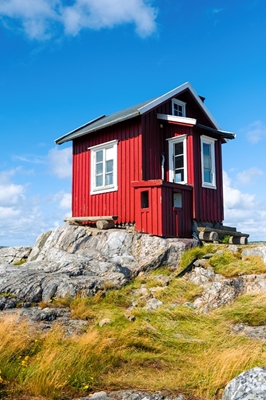 Liten rød svensk hytte