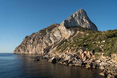 Cove, cliffs, sea and blue sky
