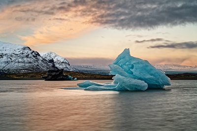 Blue iceberg in evening light