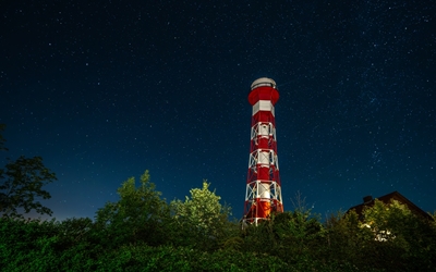 Lighthouse in the starry sky