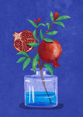 Pomegranate branch in vase