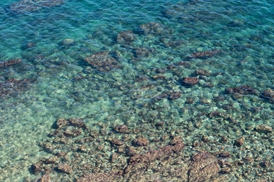 Turquoise sea water in a bay