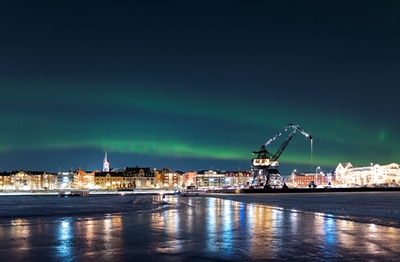 Aurora boreal da estrada de gelo em Luleå