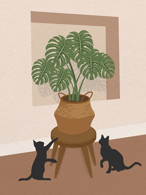 Gato jugando con la planta