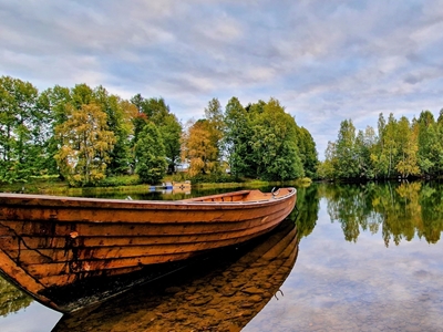 Old wooden boat by the river