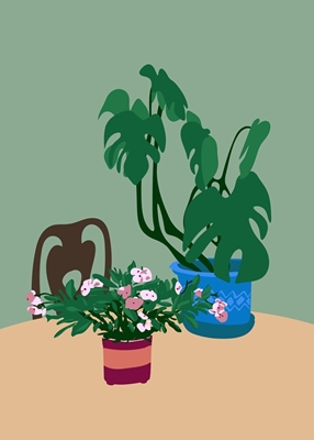 Kasvi ja kukka pöydällä