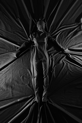Female figure under the sheet