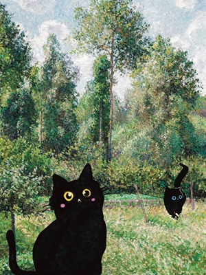 Mustat kissat vihreässä puutarhassa