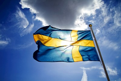 Švédská vlajka osvětlená písmeny s
