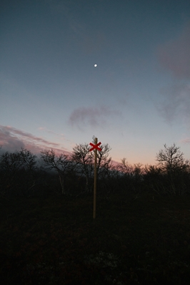 Trail cross post during dusk