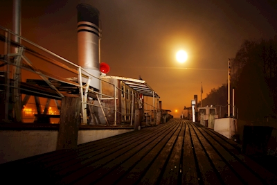 Steamships in moonlight