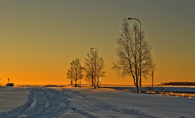 Východ slunce v přístavu Lövskär