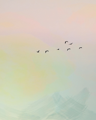 Birds in pastel colored sky