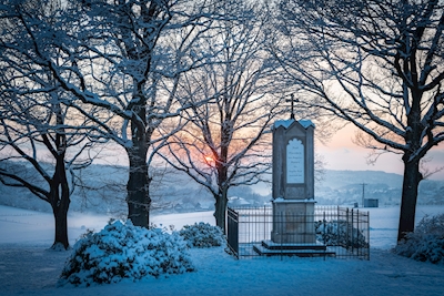 Snow-covered memorial