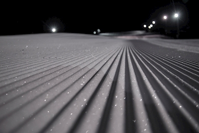 Newly prepped slope at night