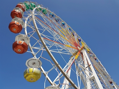 Ferris wheel and bright blue