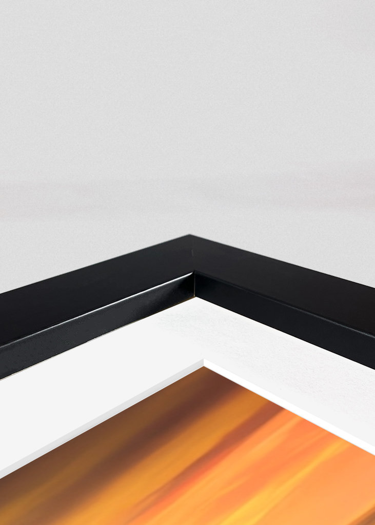 Leuchtturm und Segelboot bei Sonnenuntergang