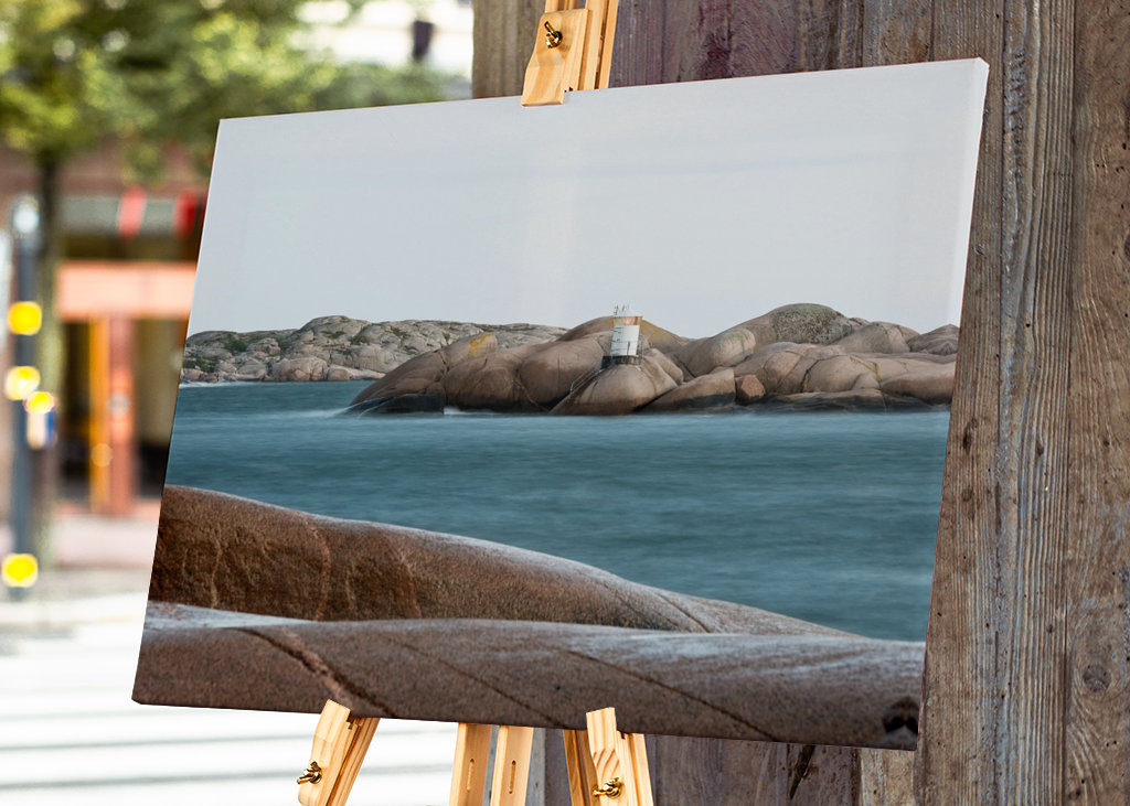 Die Felsen, das Meer und der Leuchtturm