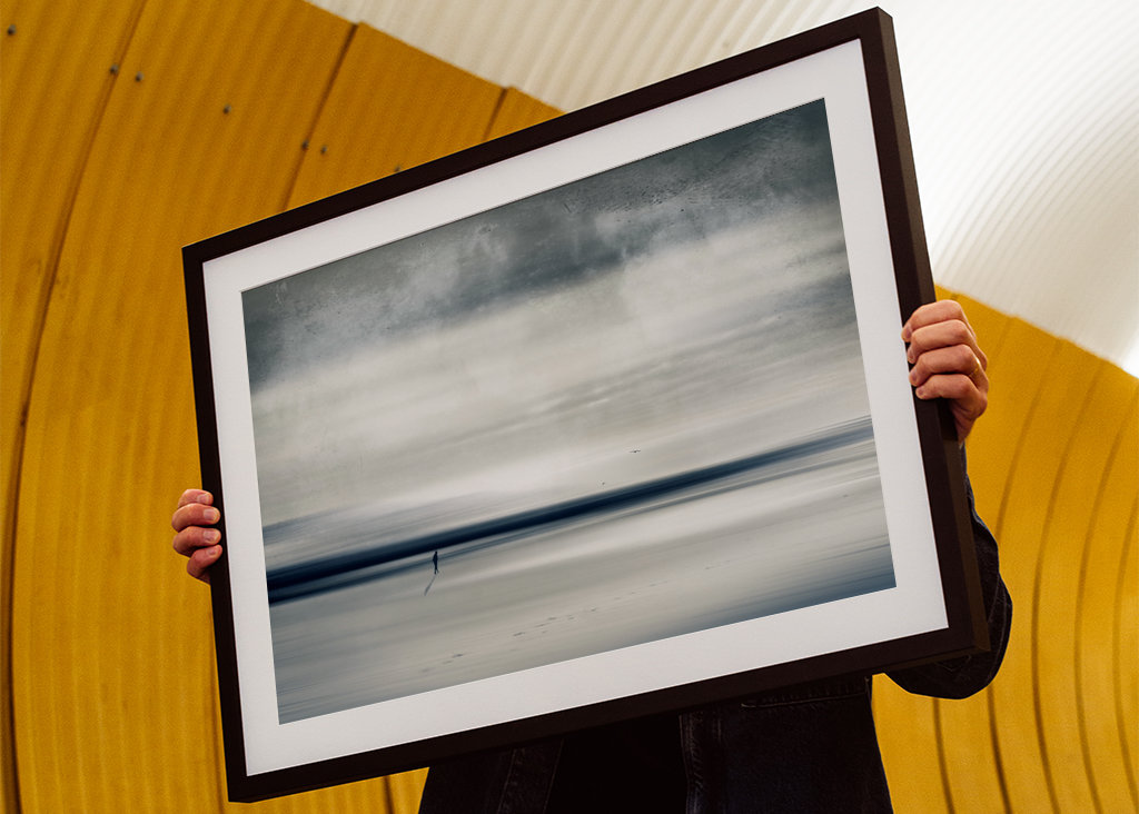 Ensom turgåer på stranden