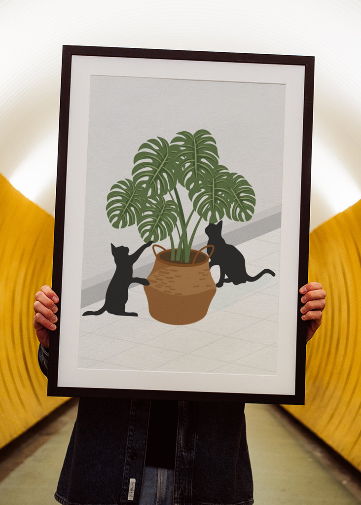 Cute cat and monstera plant