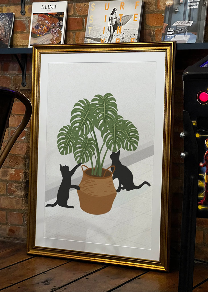 Cute cat and monstera plant