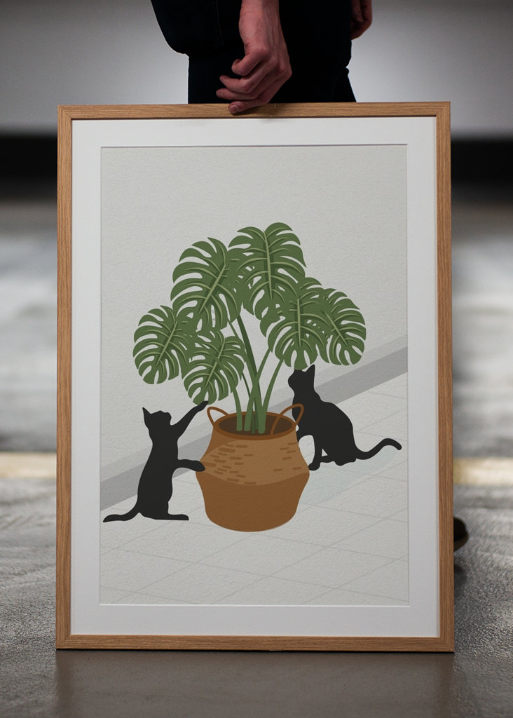 Cute cat and monstera plant