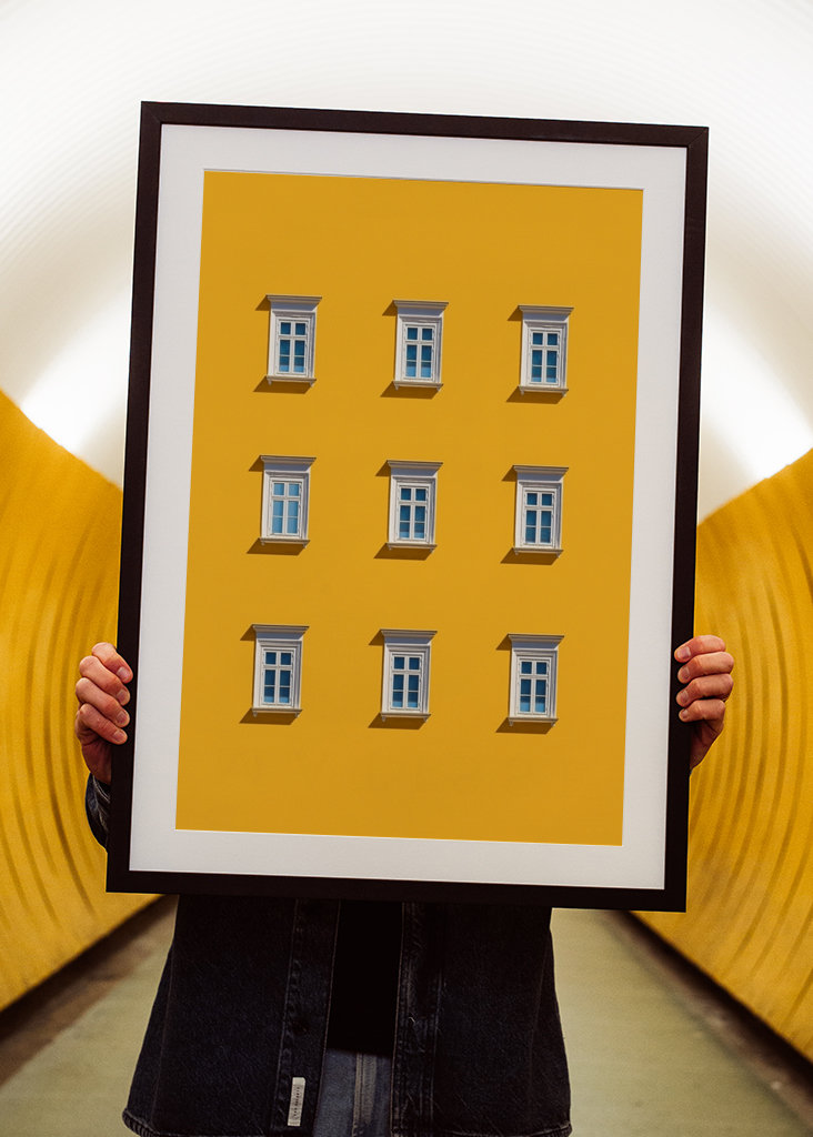 9 Windows on Yellow Wall