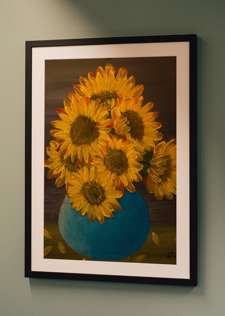 « Tournesols dans un vase bleu »