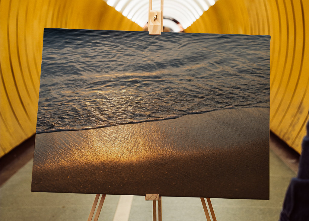 Sea water meets golden sand