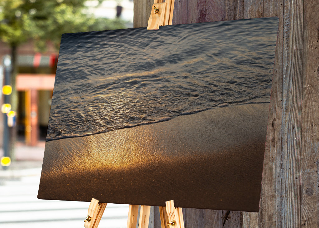 Sea water meets golden sand