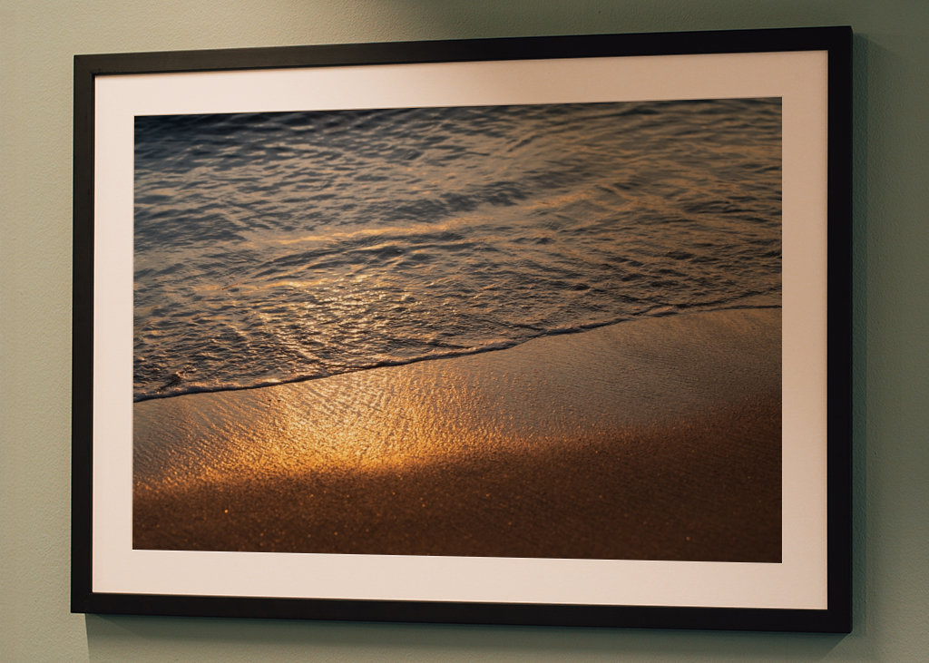 Sea water meets golden sand