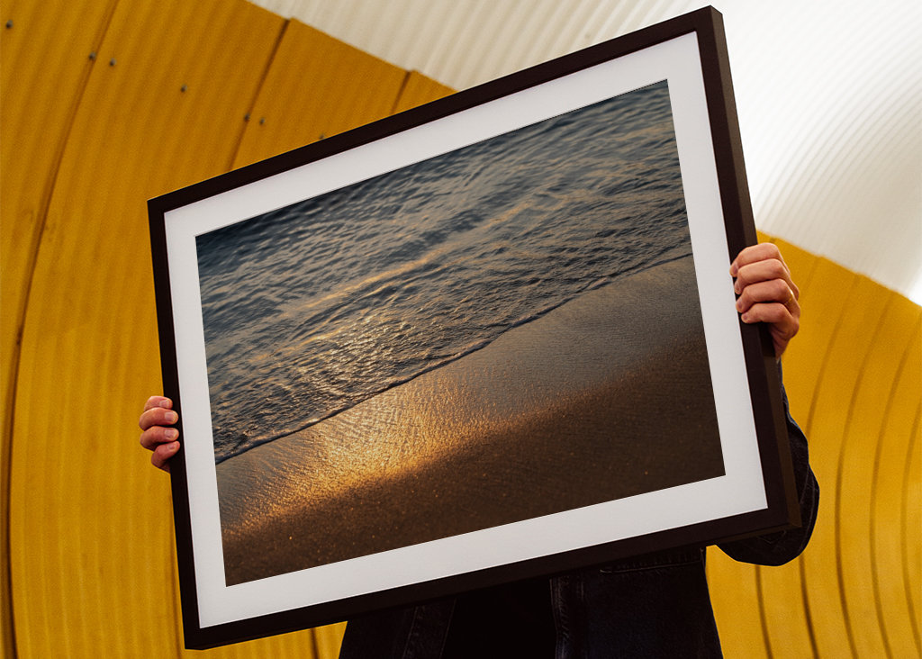 Sea water meets golden sand
