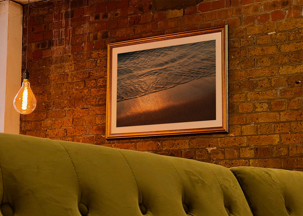 Sea water meets golden sand