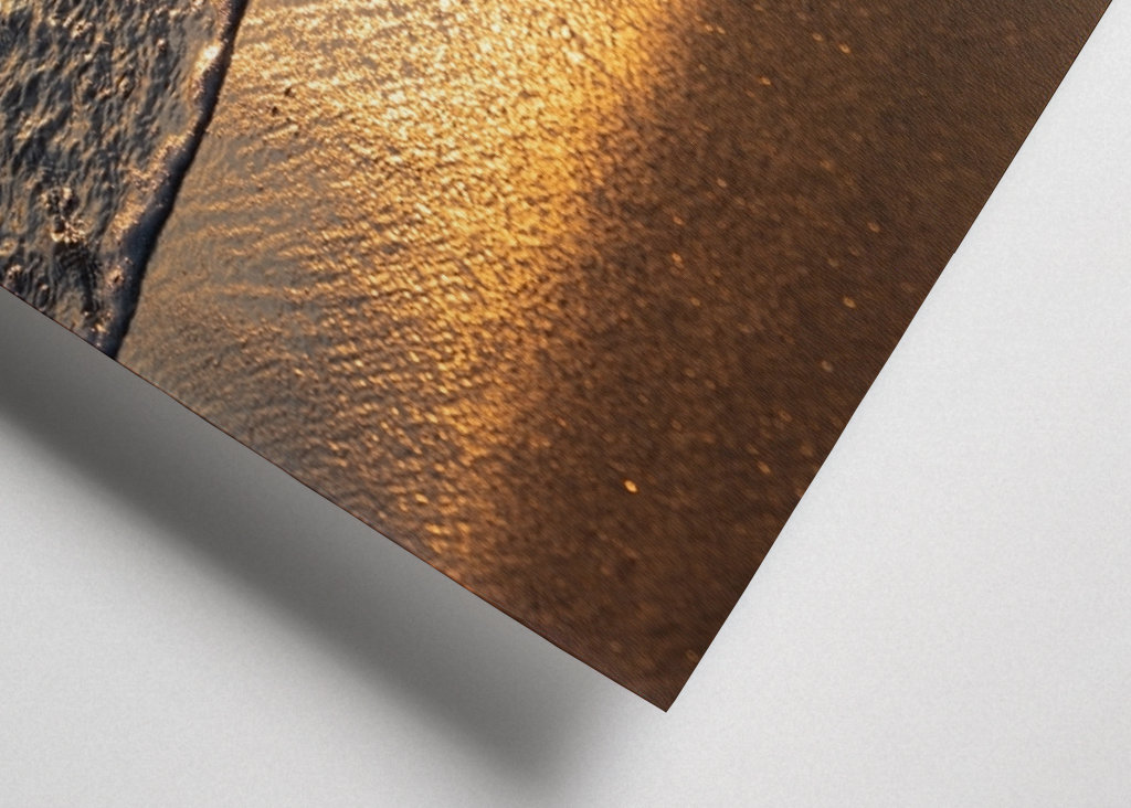 Sea water meets golden sand