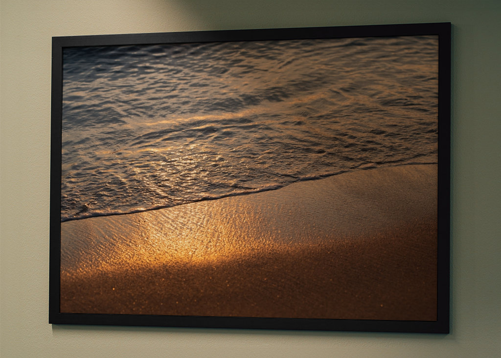 Sea water meets golden sand