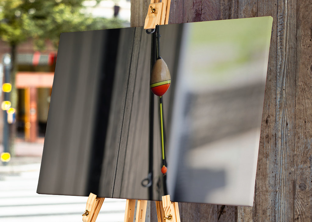 Angel an einer Fischerhütte