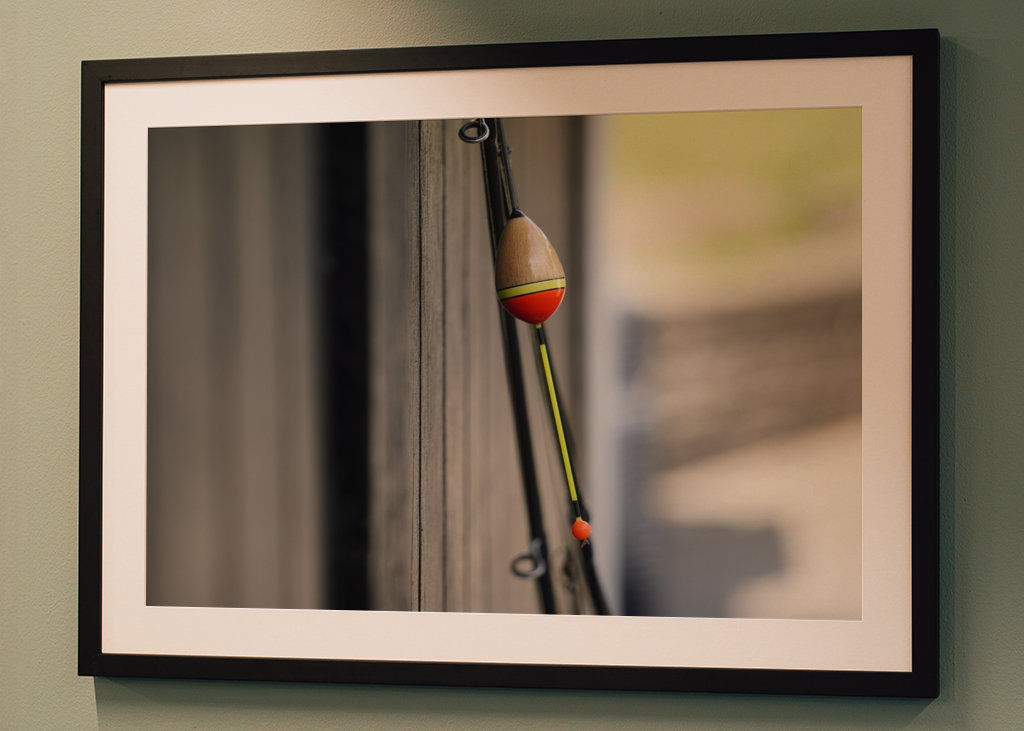 Angel an einer Fischerhütte