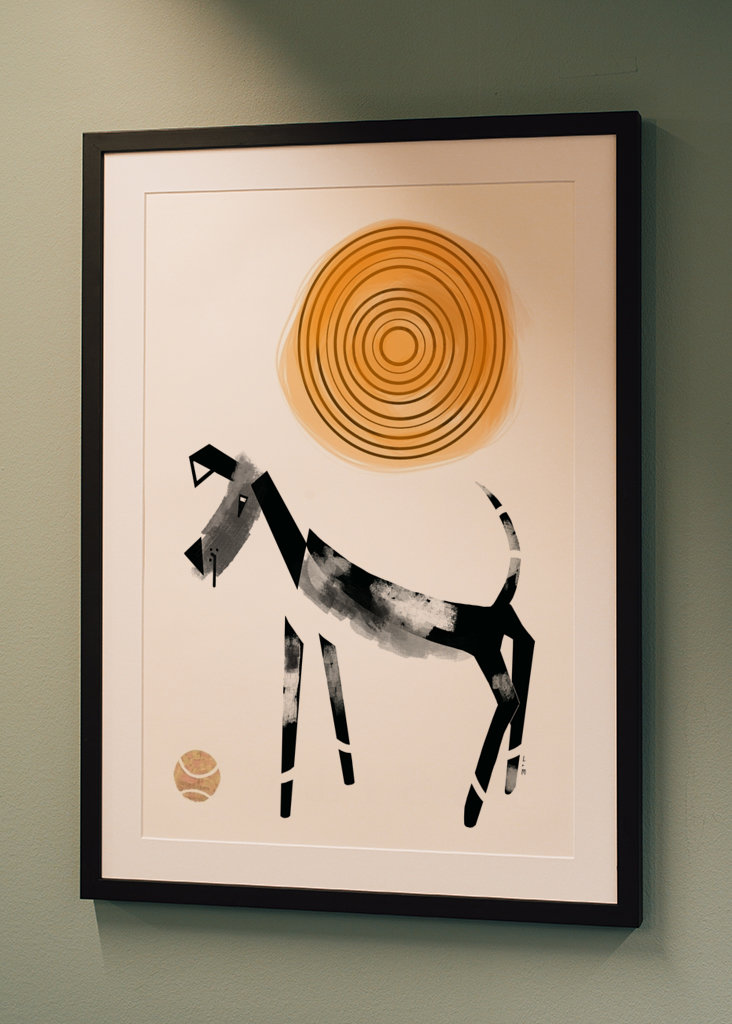 Dog with ball black and white