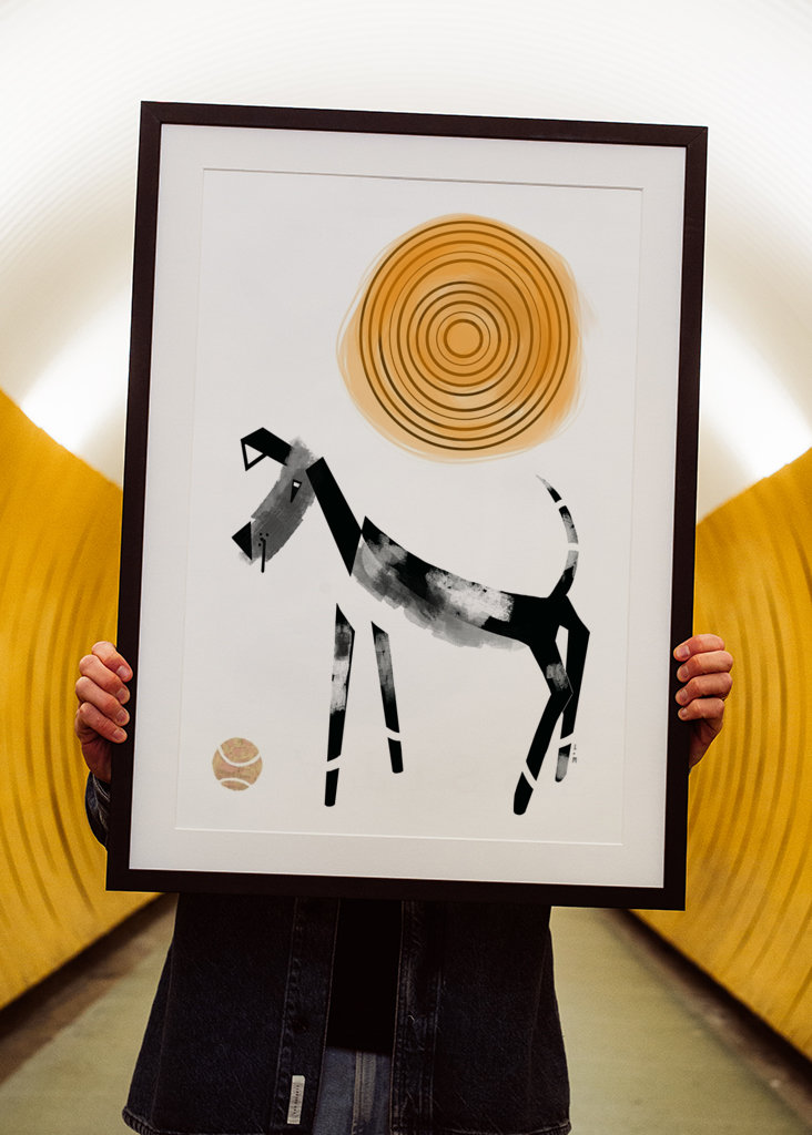 Dog with ball black and white