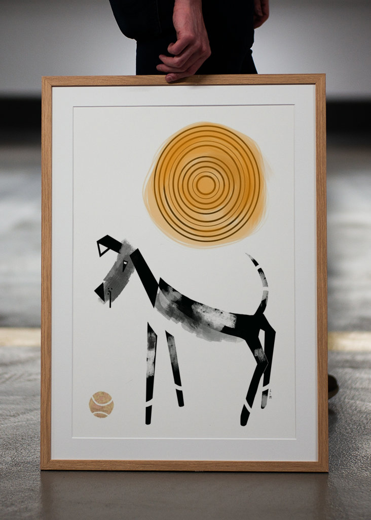 Dog with ball black and white