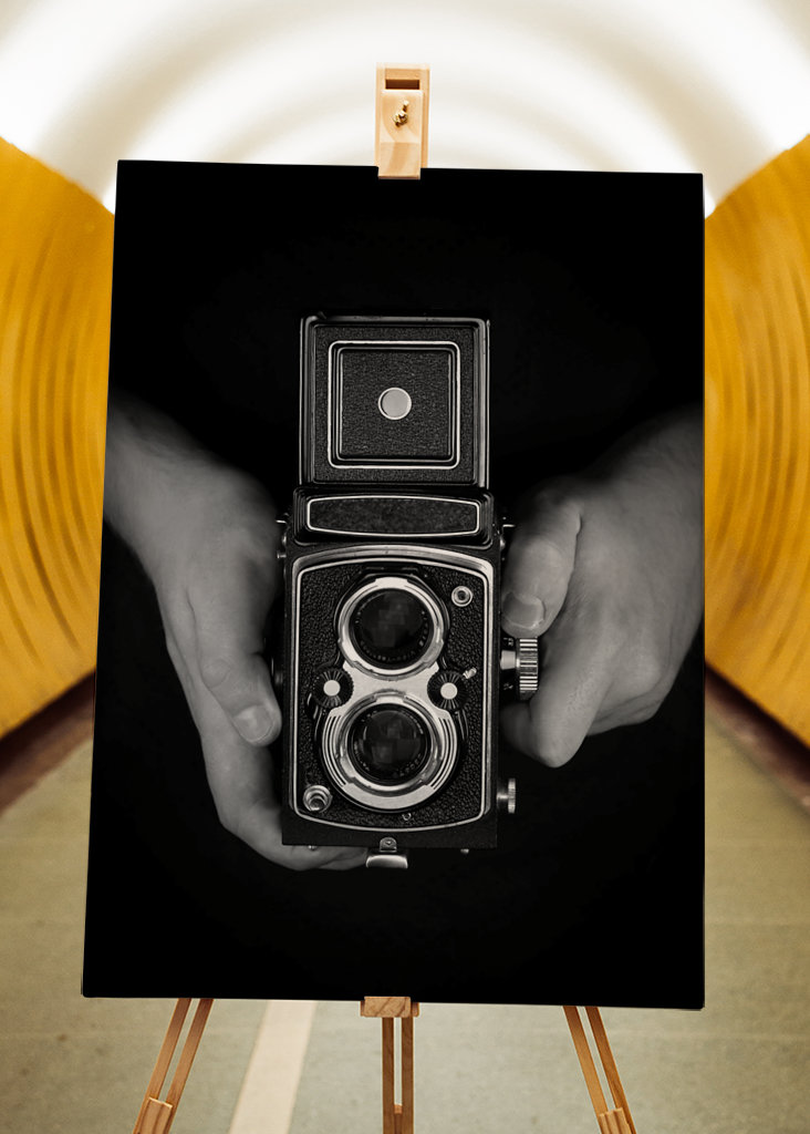 Tenir l’ancien appareil photo