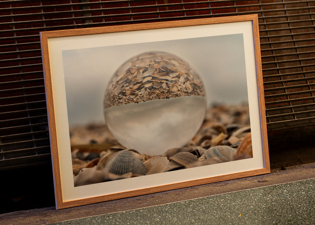 Glass ball in a pile of shells