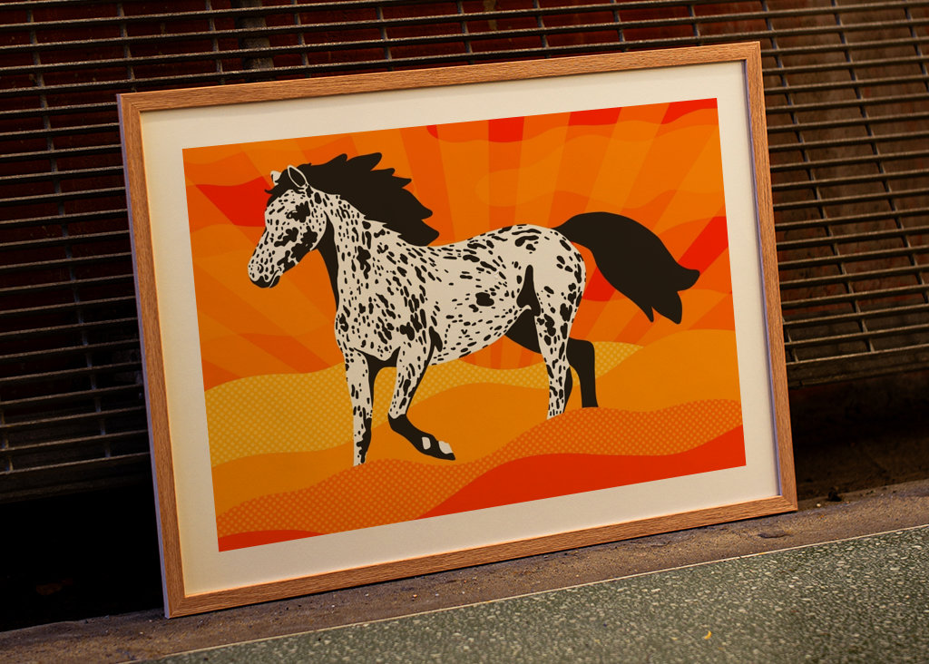 Plettet hest ved solnedgang