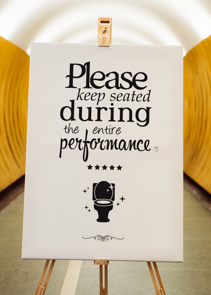 Keep seated - Bathroom sign