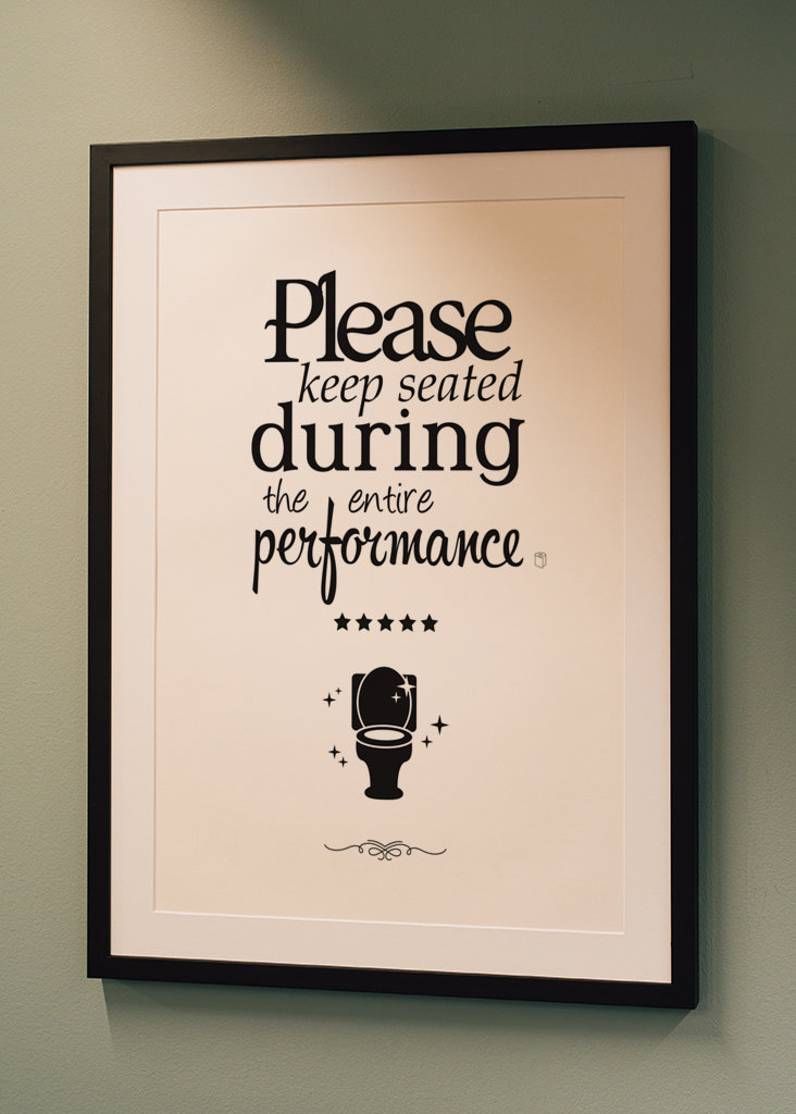 Keep seated - Bathroom sign