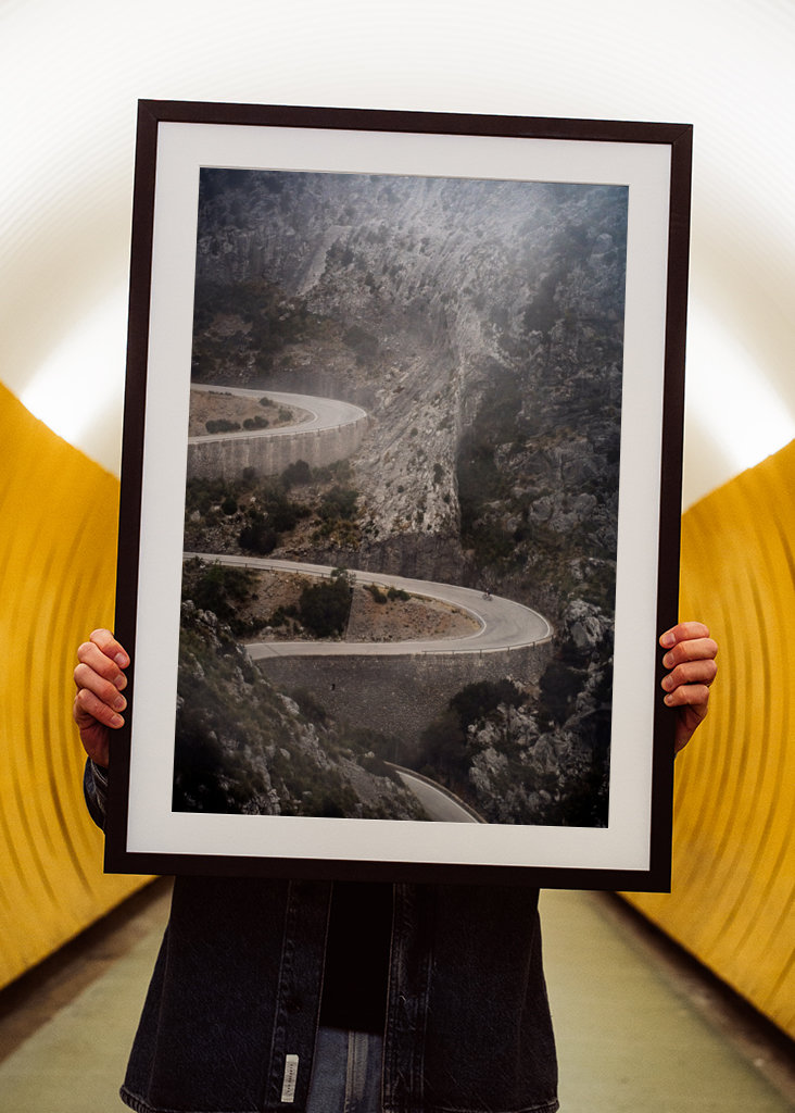 Cyclist climbing Sa Calobra