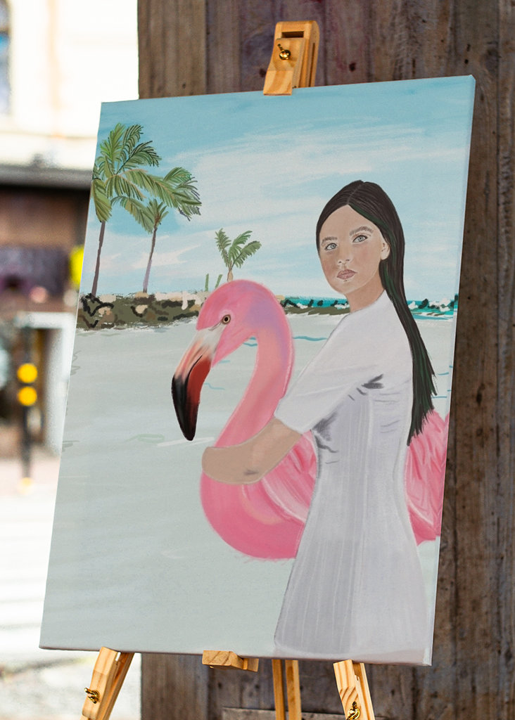 Flamingo und Mädchen am Strand von Aruba